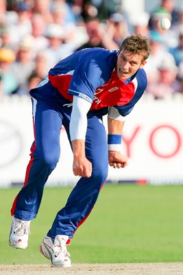 Chris Tremlett of England bowls 