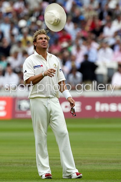 Shane Warne tosses his hat 