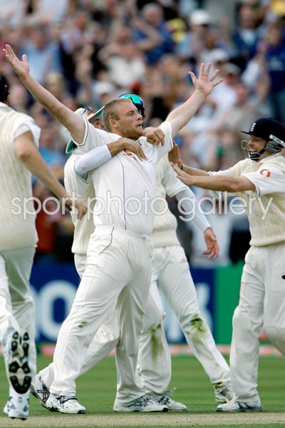 Andrew Flintoff congratulated by team mates 