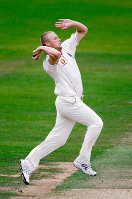 Andrew Flintoff bowls