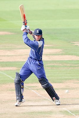 Nick Knight of Warwickshire hits a boundary 