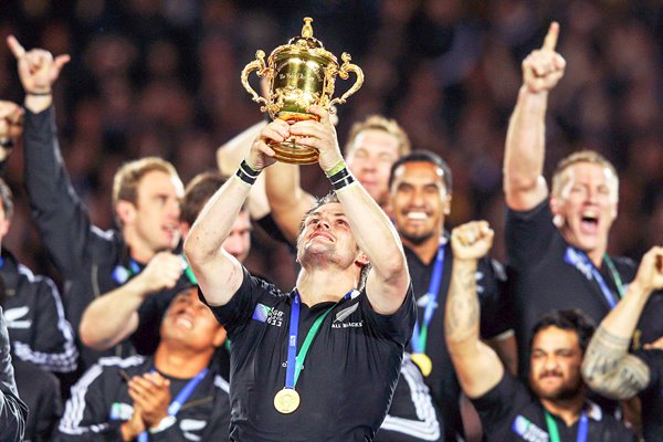 Richie McCaw looks up at World Cup trophy