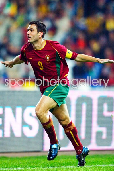 Pauleta of Portugal celebrates