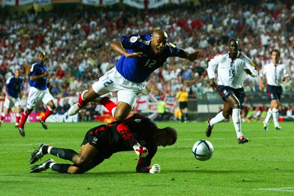 Thierry Henry dives over David James