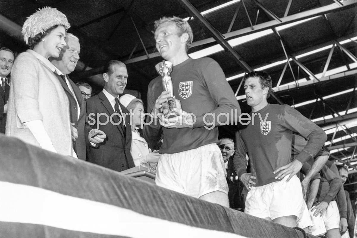 Bobby Moore Receives The World Cup From The Queen 1966 Poster 