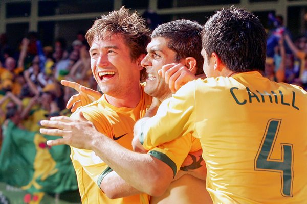 Harry Kewell and Australia celebrate