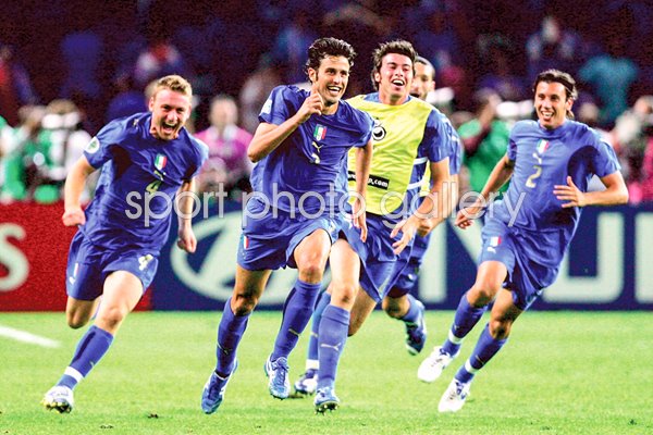 Fabio Grosso of Italy celebrates victory 