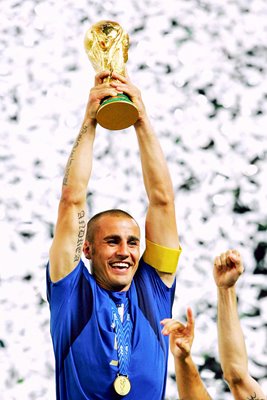 Fabio Cannavaro of Italy lifts the World Cup