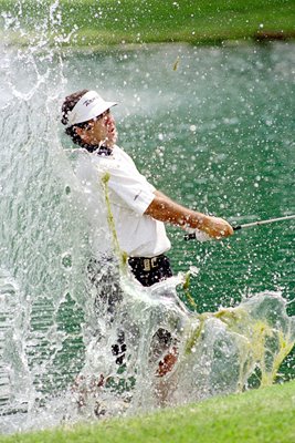 David Frost hits out of a water