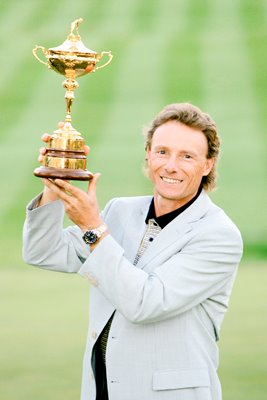 Bernhard Langer holds the trophy 