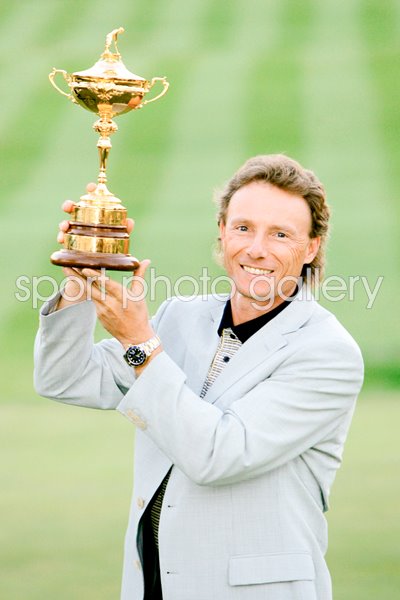 Bernhard Langer holds the trophy 