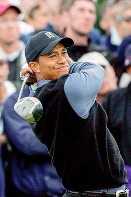 Tiger Woods tees off