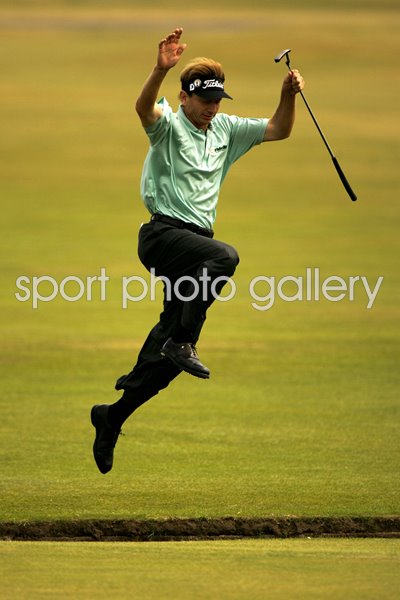 Brad Faxon leaps the Swilken Burn