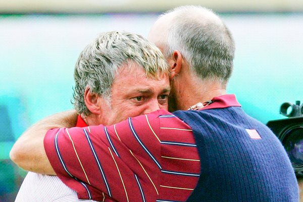 Tom Lehman hugs Darren Clarke