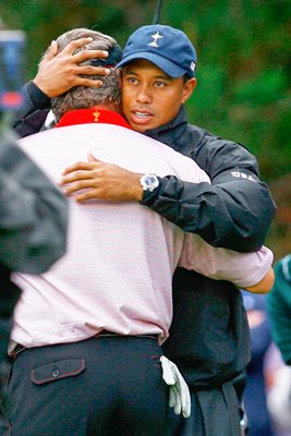 Tiger Woods hugs Darren Clarke