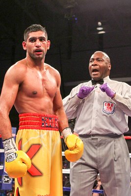 Referee Joe Cooper penalises Amir Khan 2011