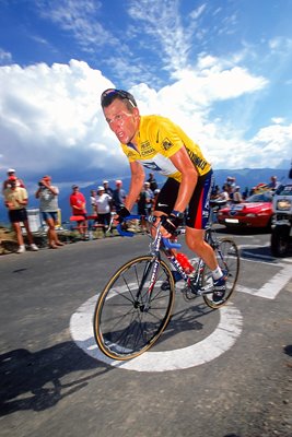Lance Armstrong climbing action