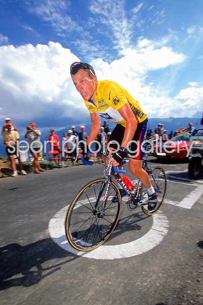 Lance Armstrong climbing action