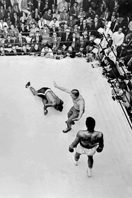 Cassius Clay knocks down Floyd Patterson