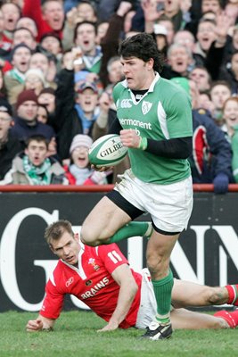 Shane Horgan goes past Dafydd James