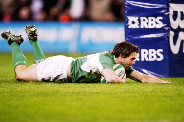 Isaac Boss of Ireland scores between the posts