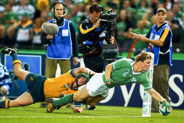 Brian O'Driscoll of Ireland scores a try