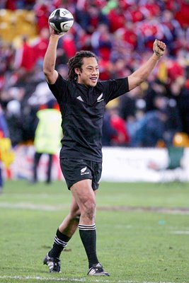 Tana Umaga celebrates