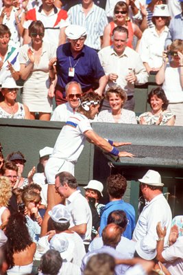 Pat Cash climbs into the crowd