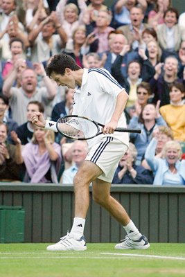 Tim Henman celebrates  