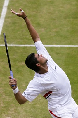 Mark Philippoussis serves 