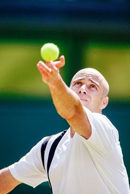 Andre Agassi prepares to serve