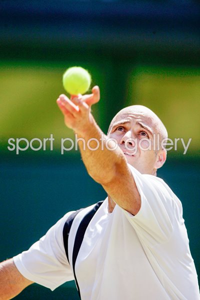 Andre Agassi prepares to serve 