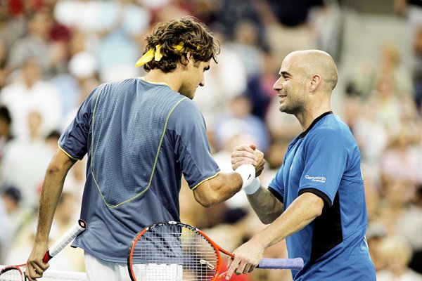 Andre Agassi congratulates Roger Federer 