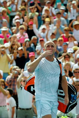 Andre Agassi blows kisses to the crowd 