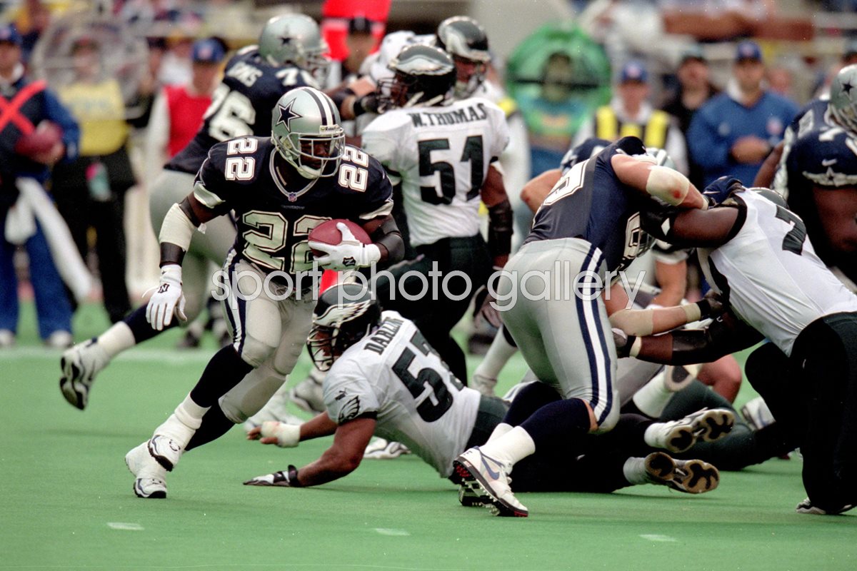 Emmitt Smith of the Dallas Cowboys carries the ball against the