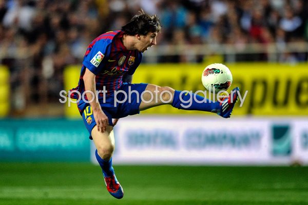 Lionel Messi of FC Barcelona controls the ball 