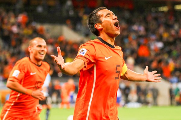 Van Bronckhorst and Sneijder celebrate