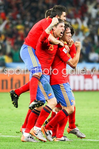 Spain team mates celebrate scoring v Germany