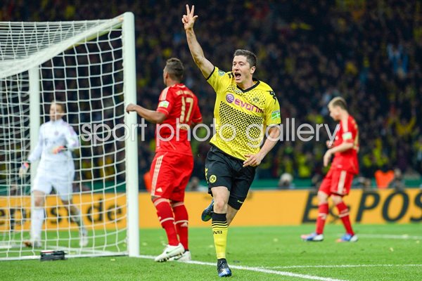 Robert Lewandowski celebrates scoring his third v Bayern Munich