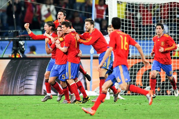 Carles Puyol of Spain celebrates with his team mates