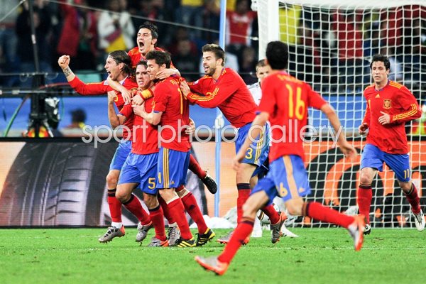 Carles Puyol of Spain celebrates with his team mates