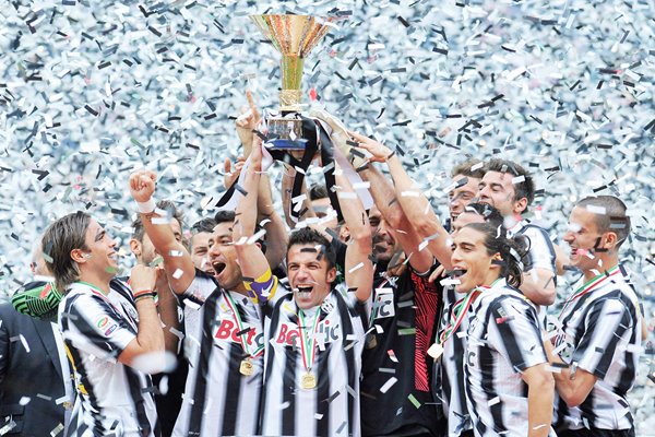 Juventus players celebrate winning SERIE A