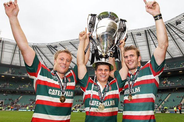 Crane, Youngs and Croft of Leicester Tigers celebrate with the trophy