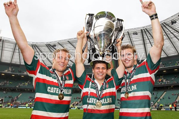 Crane, Youngs and Croft of Leicester Tigers celebrate with the trophy
