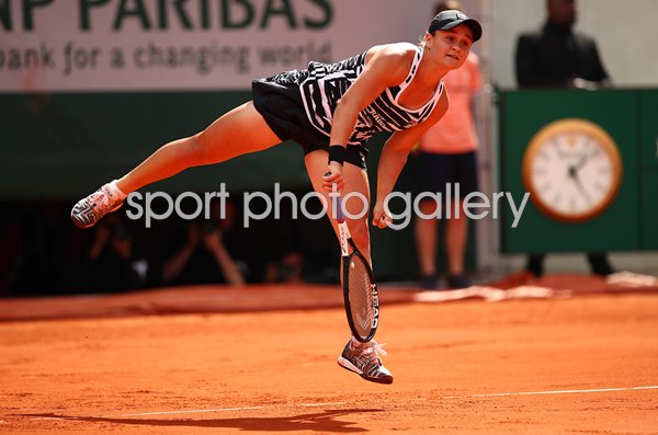 Ashleigh Barty Australia serves French Open Champion Paris 2019