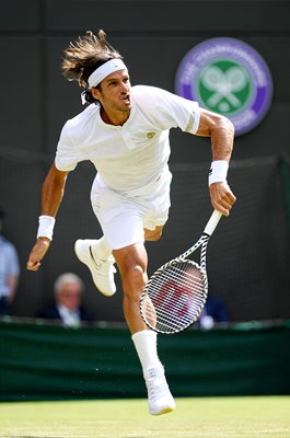 Feliciano Lopez Spain serves v Karen Khachanov Wimbledon 2019