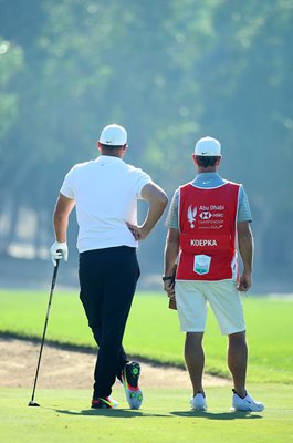 Brooks Koepka USA & caddie Ricky Elliott Abu Dhabi Championship 2020