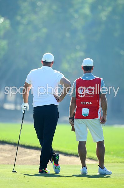 Brooks Koepka USA & caddie Ricky Elliott Abu Dhabi Championship 2020