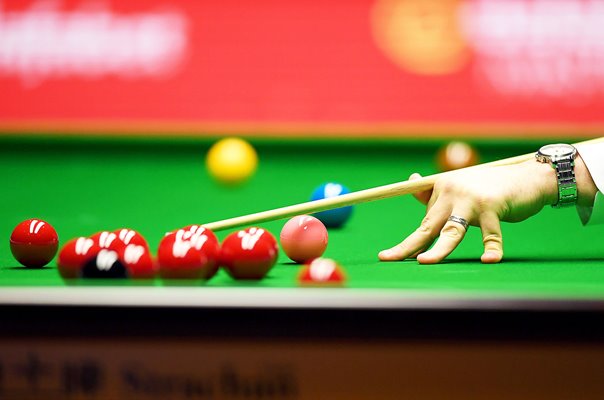 Snooker player cue and snooker balls Masters 2020