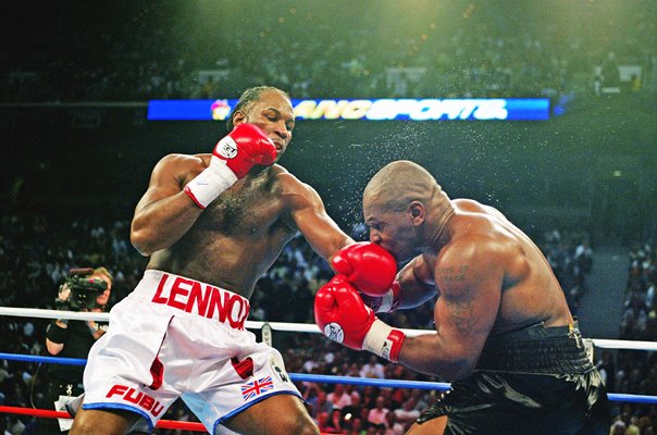 Lennox Lewis punches Mike Tyson Heavyweight Title Fight Memphis 2002